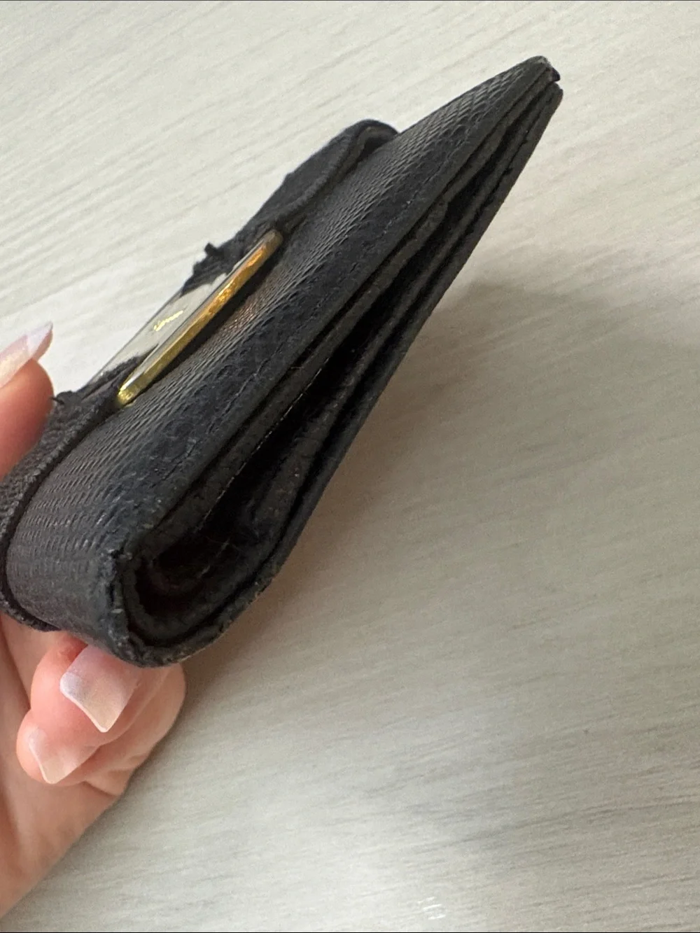 Salvatore Ferragamo Black Textured Leather Wallet with Gold Buckle